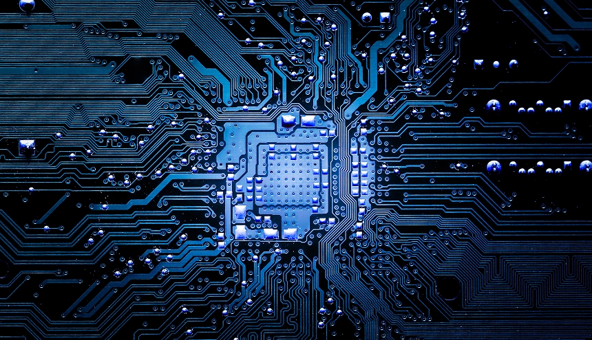 A highly organized array of bright blue data cables arching neatly into server racks in a data center, lit with a cool blue tone