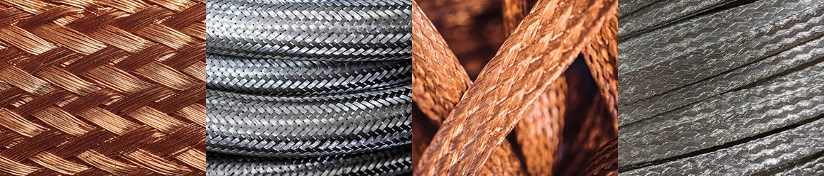 Close up of two thick, intertwined braided copper cables showing the tight diagonal weave pattern.